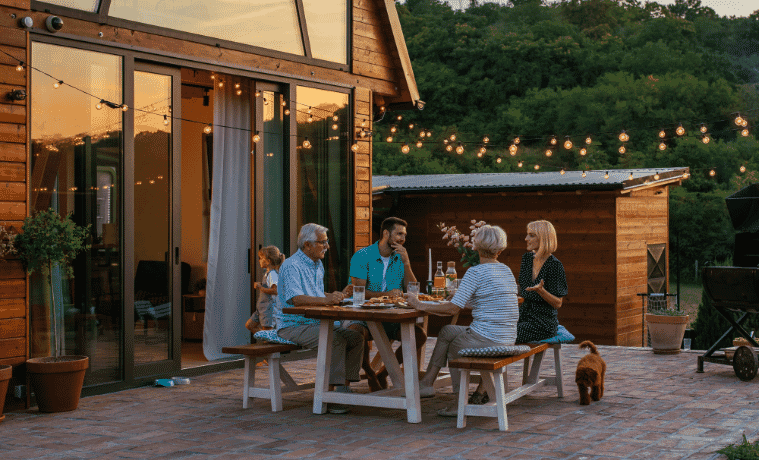 Family enjoying their DIY outdoor kitchen