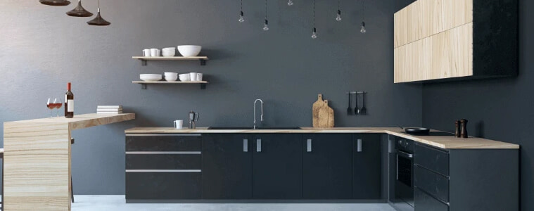 A black kitchen balanced by light coloured timber
