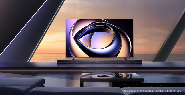 A Toshiba QLED TV in a sleek modern living room overlooking snowy mountains