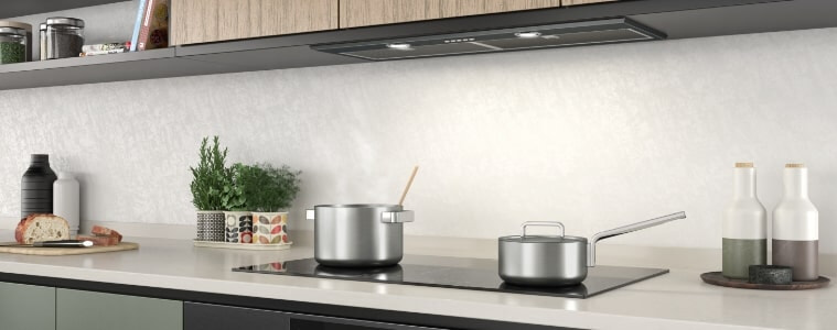 An induction cooktop in a straight line kitchen