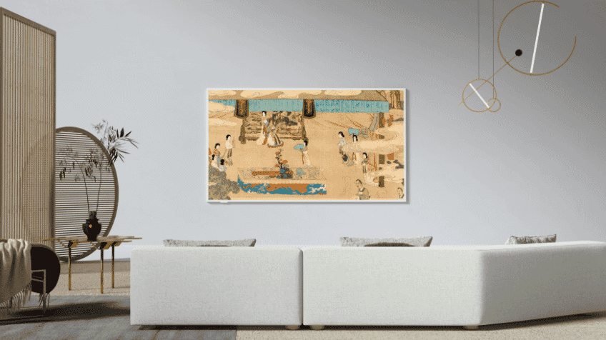Lifestyle image of the TCL NXTFRAME Tv on a wall in a modern living room
