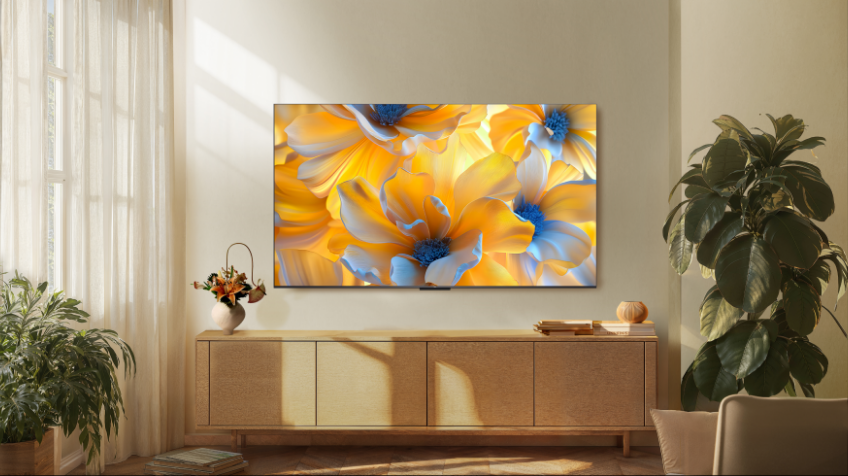 A mini LED TCL TV is mounted on a wall