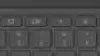 Man typing on his Chromebook.