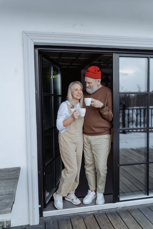 A man and woman that are happy with their Medicare plan