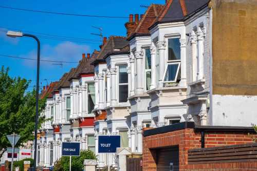 Row of houses with sold sign