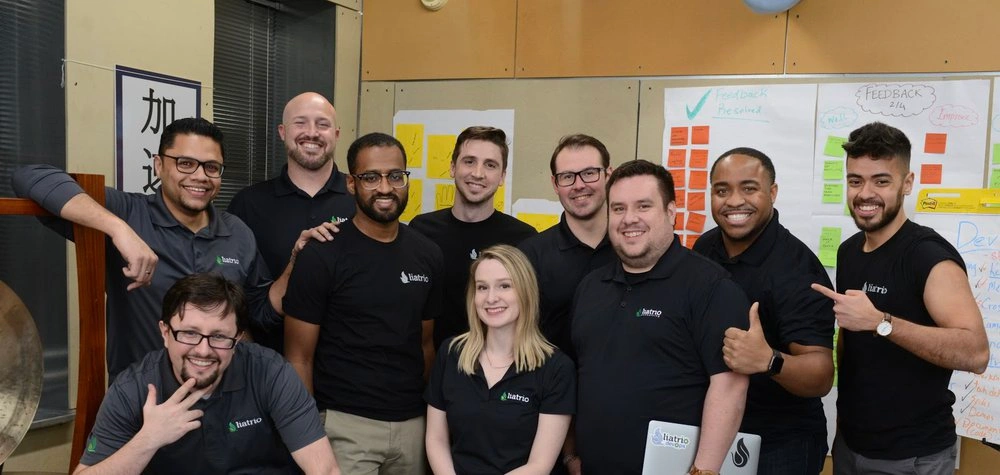 Liatrio Dojo coaches posing for a photo.