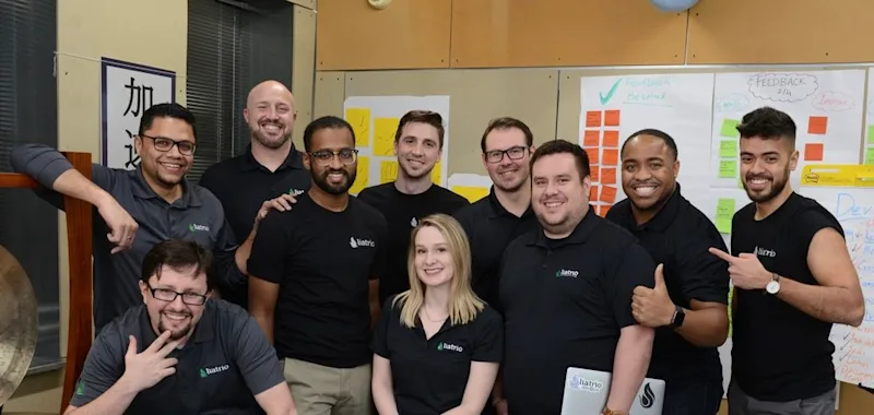 Liatrio Dojo coaches posing for a photo.