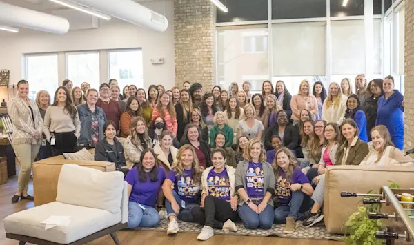 Members of Women nTech pose in the nCino kitchen.