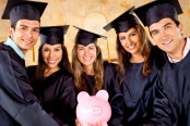 Graduate students holding a piggybank
