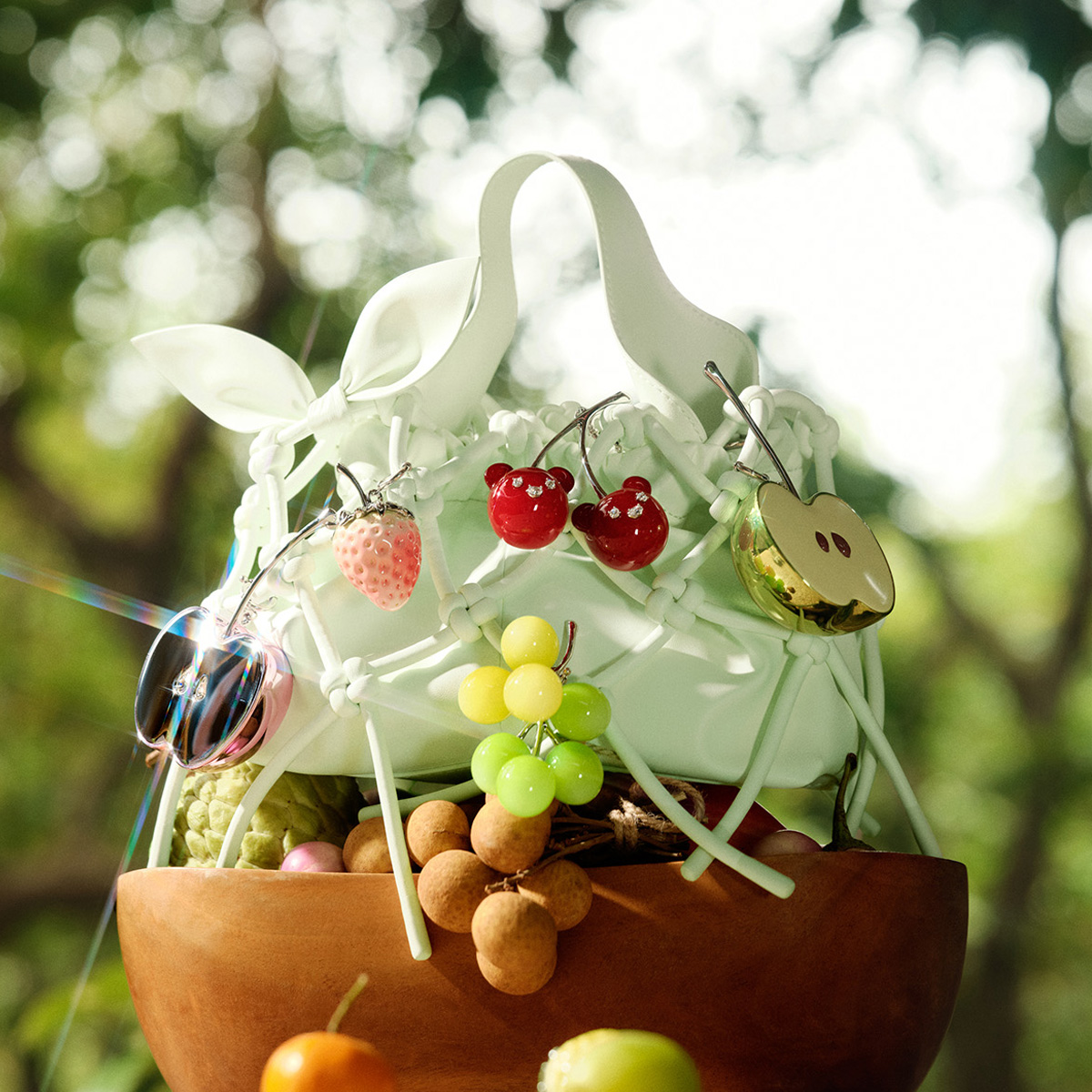 Yvmin X Charles & Keith team up for a fruity summer