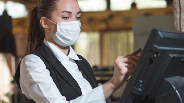 Hotel receptionist, Europe summer vacation, wearing mask, Covid-19 safe travel