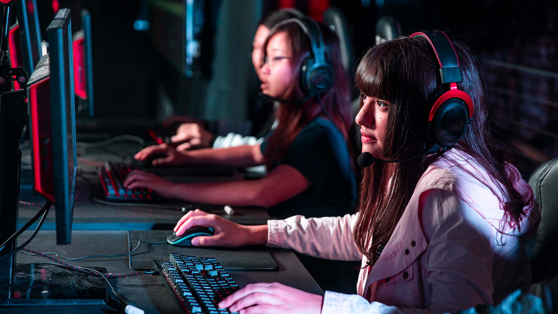 Girl with headset playing games
