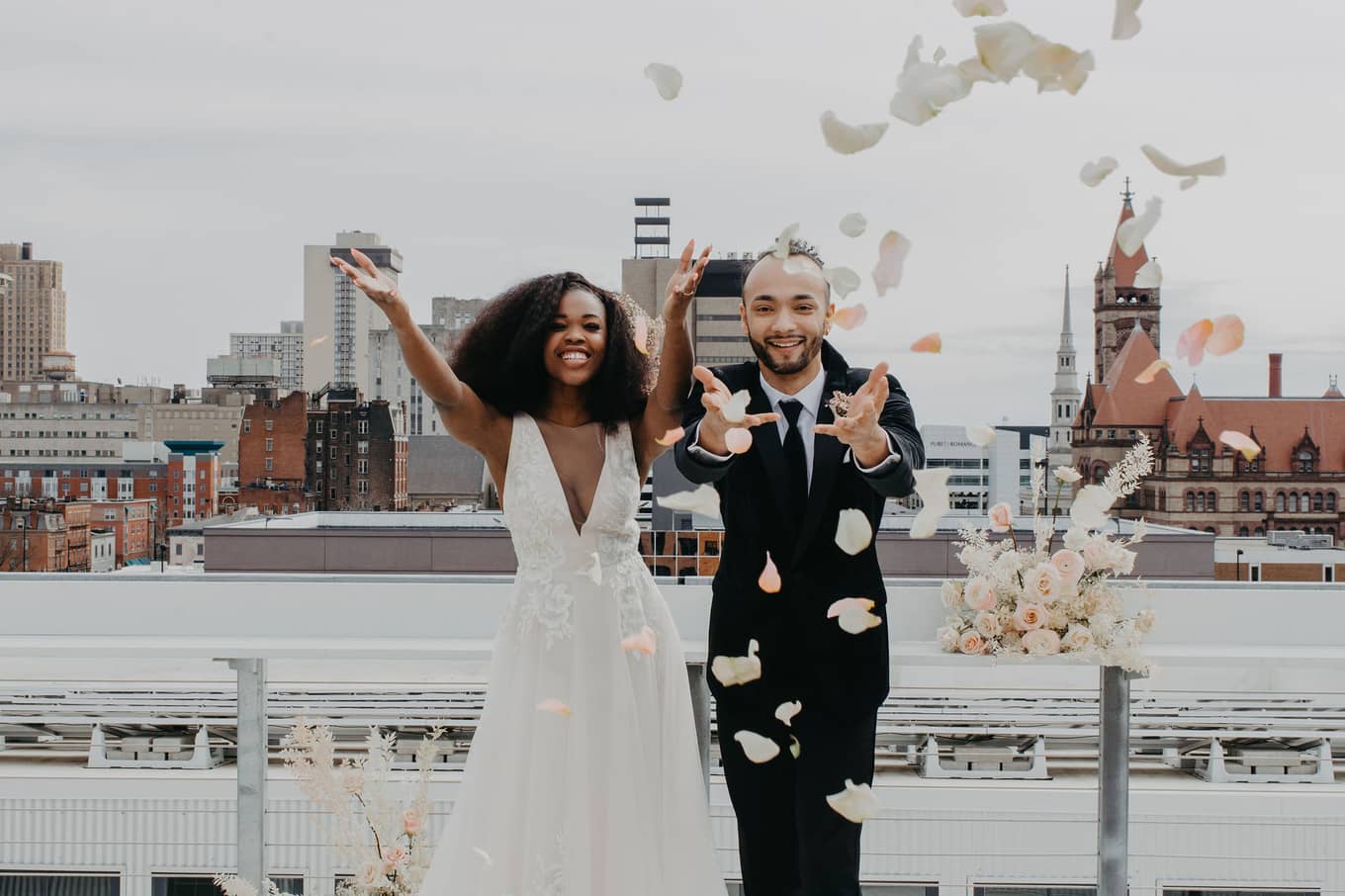 wedding scene with bride and groom, confetti falling