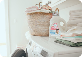 Folded clothes on a washing machine