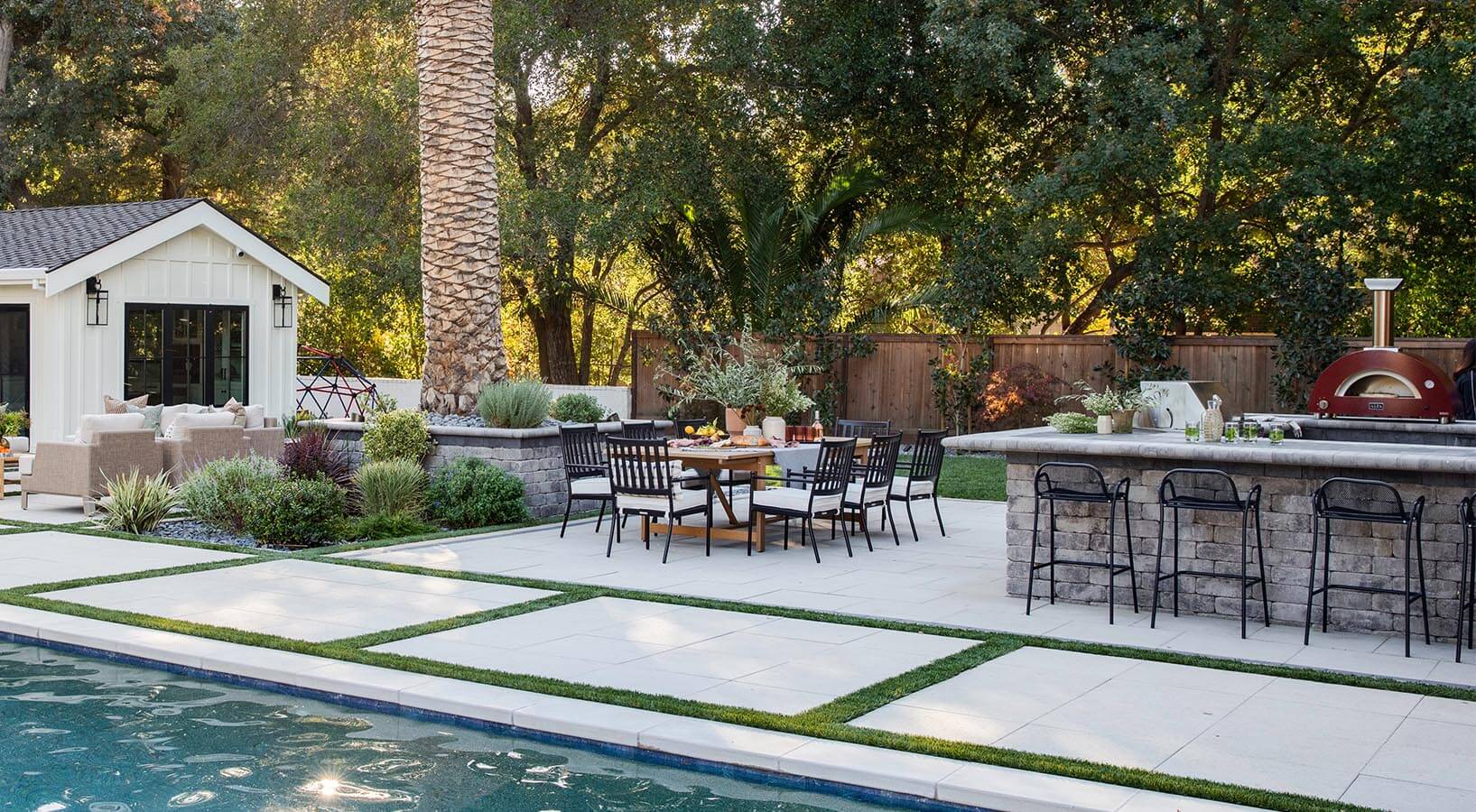 Paver patio with seating and lighting
