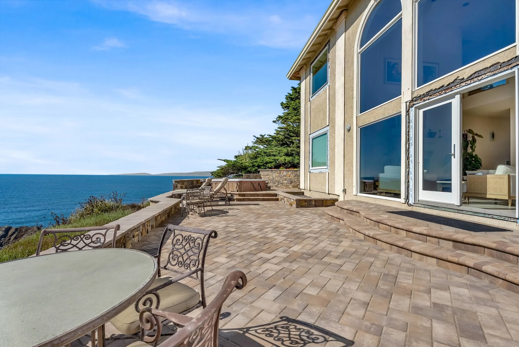 View of Seaside Paving Stone Patio with Retaining Walls, and Steps