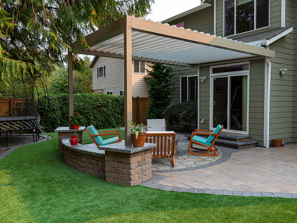 Backyard paver patio with pergola in Seattle installed by System Pavers