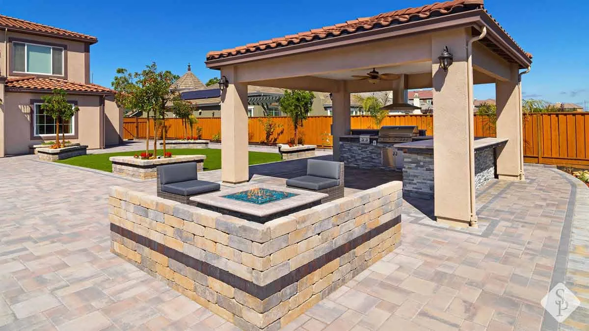 paver patio, pergola, and square fire pit