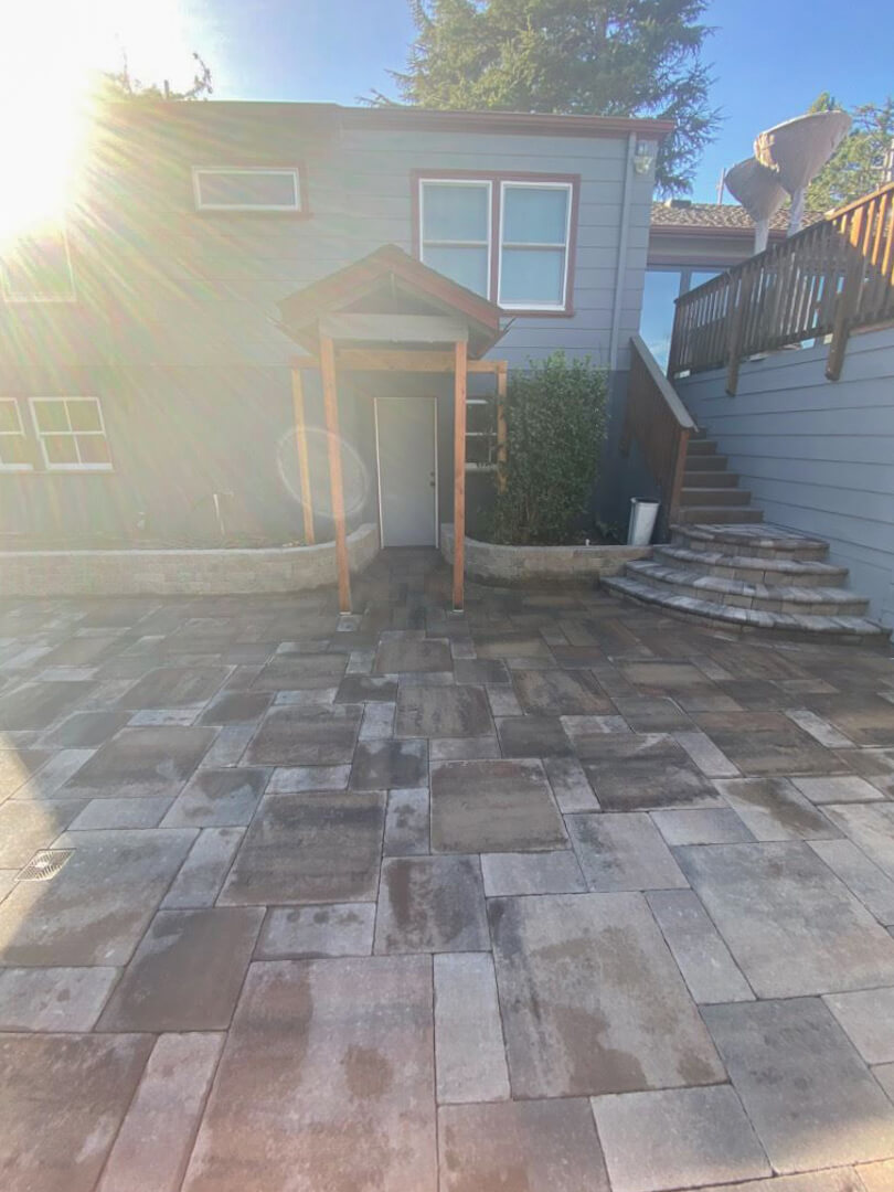 The Osur family get a paving stone courtyard built for entertaining