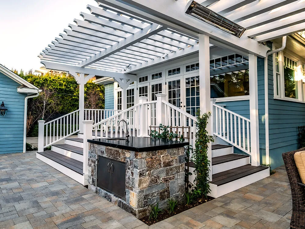 paver patio, pergola, decking and outdoor kitchen and sink storage