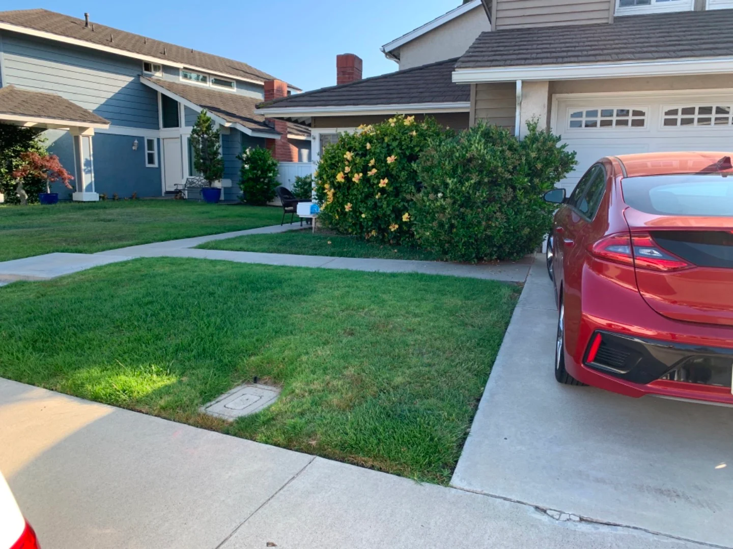 SoCal home with concrete driveway and walkway before System Pavers paver remodel 