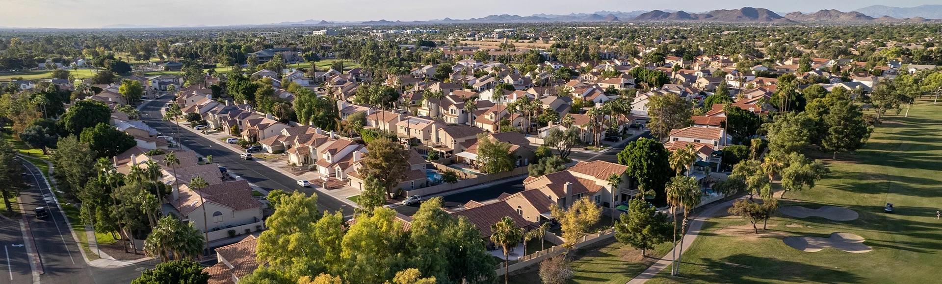 Scenic residential area with green trees. Arrowhead Ranch, Glendale, Arizona, United States