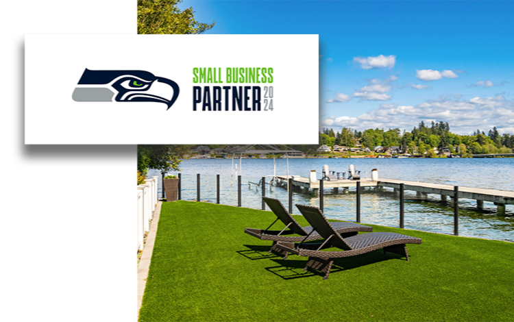 Artificial turf lawn on the water in Seattle with a Seattle Seahawks logo. 