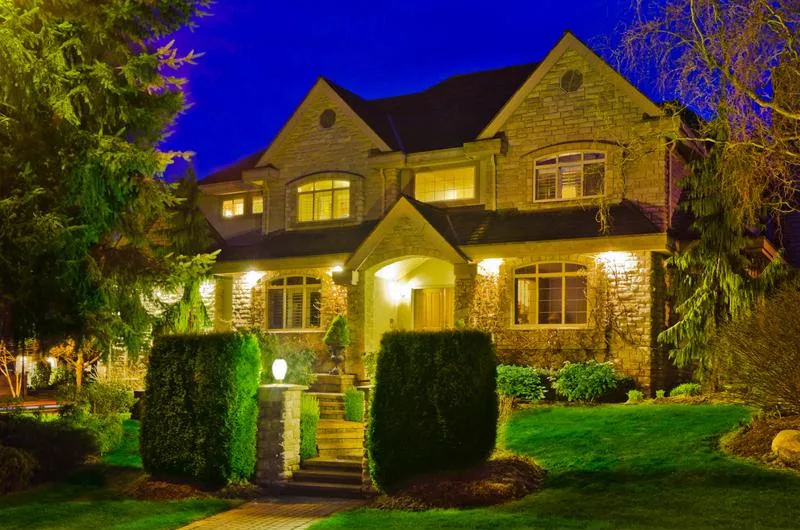 house with uplighting