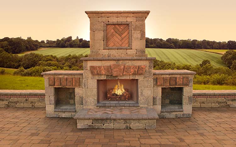 Outdoor fireplace on patio pavers 
