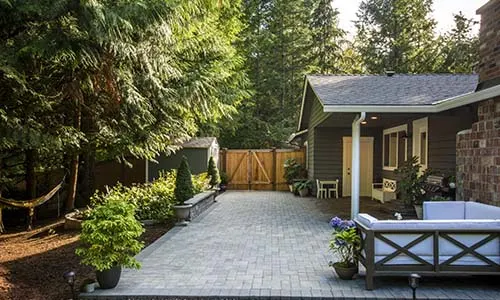 Patio, paver patio, retaining wall, paving stones, patio furniture, outdoor living space, PNW, Oregon, Washington, universal region, daytime