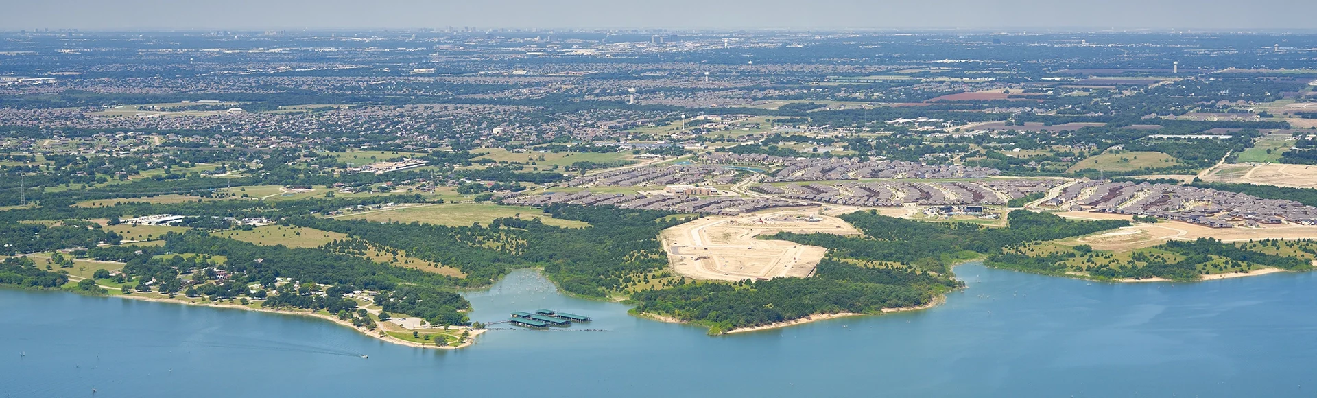 Aerial view of Lavon Lake, Texas, USA. Fresh water reservoir, located in Collin County, part of the Dallas-Fort Worth-Arlington, Texas Metropolitan Area. City of Lucas, suburban residential are