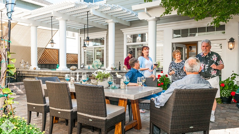 people on a patio with pergola