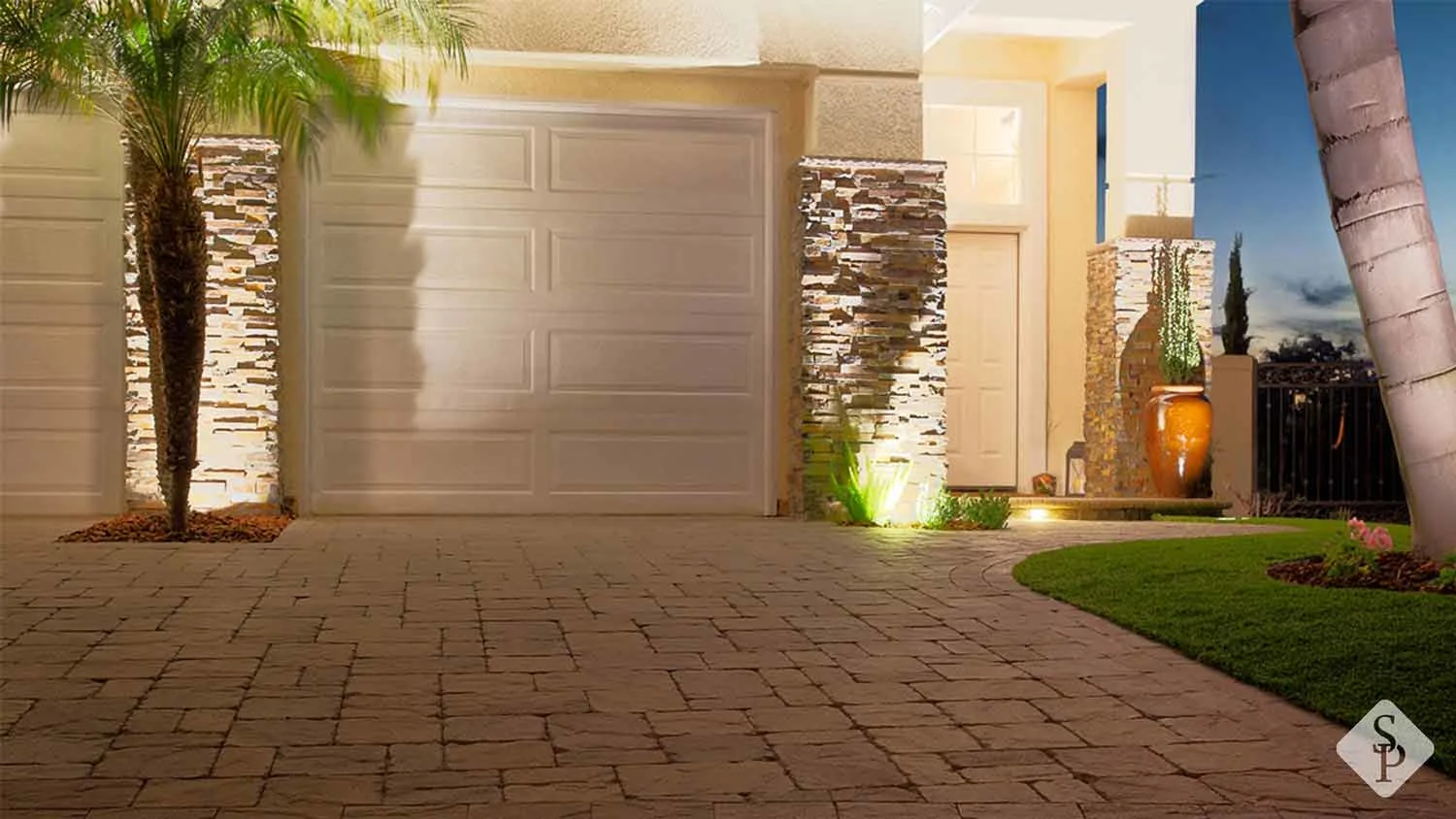 paver driveway and uplighting