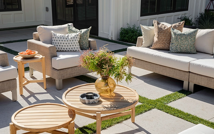 Atlanta backyard with small paver patio. Features beautiful furniture. Ready for cozy chats and backyard hangs.