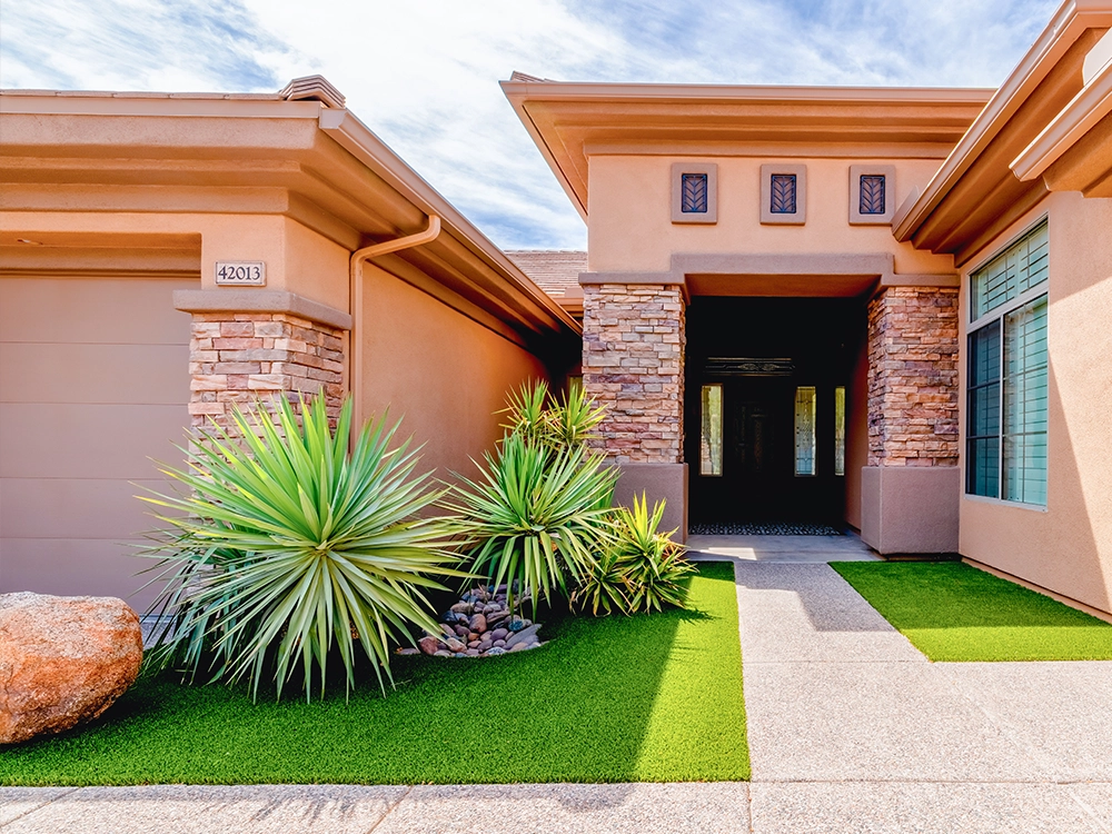 Front of a home in Arizona with weather-resistant artificial turf. 