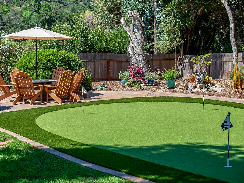 Backyard putting green turf and pavers