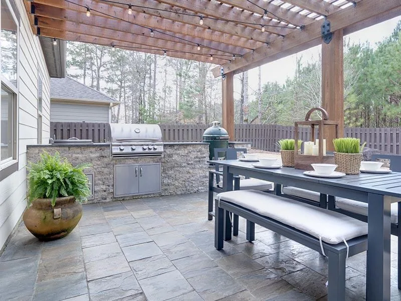 outdoor kitchen under a pergola
