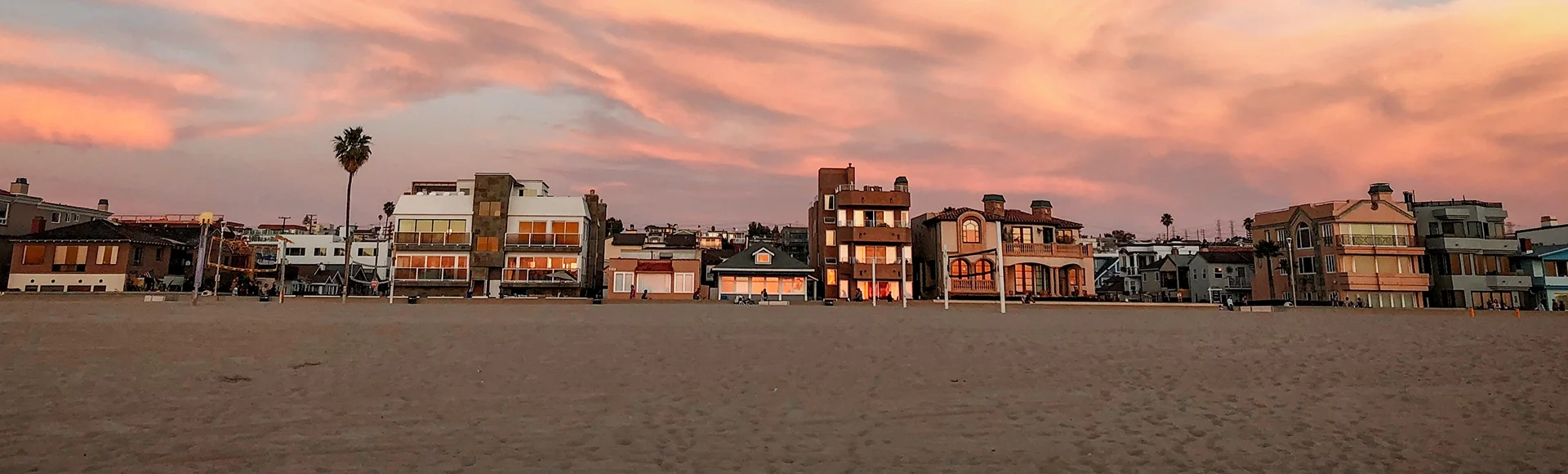 
Houses on the strand in Hermosa Beach, California, USA at sunset as seen from the sand