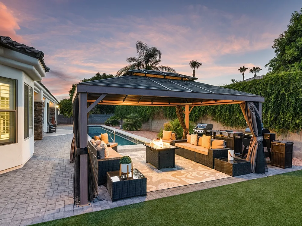 Arizona yard with paving stones and pergola. 