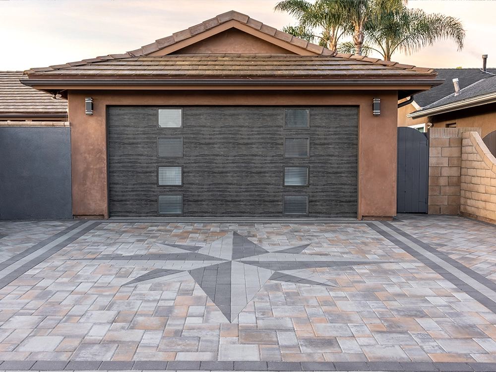 Paving stone driveway with built-in star design in Southern California. 