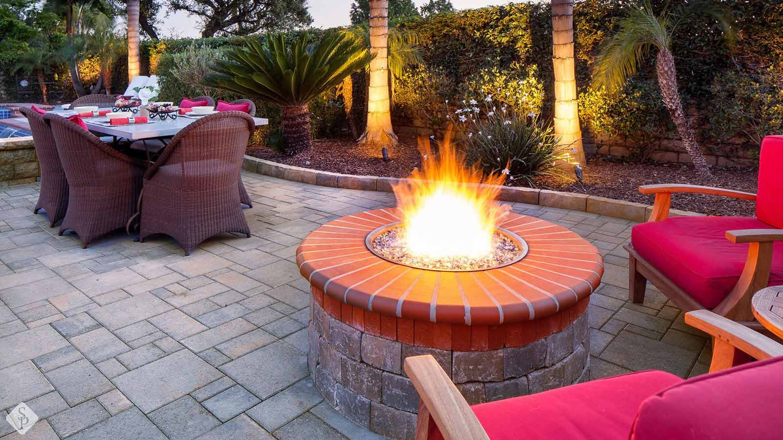 paver patio with round fire pit