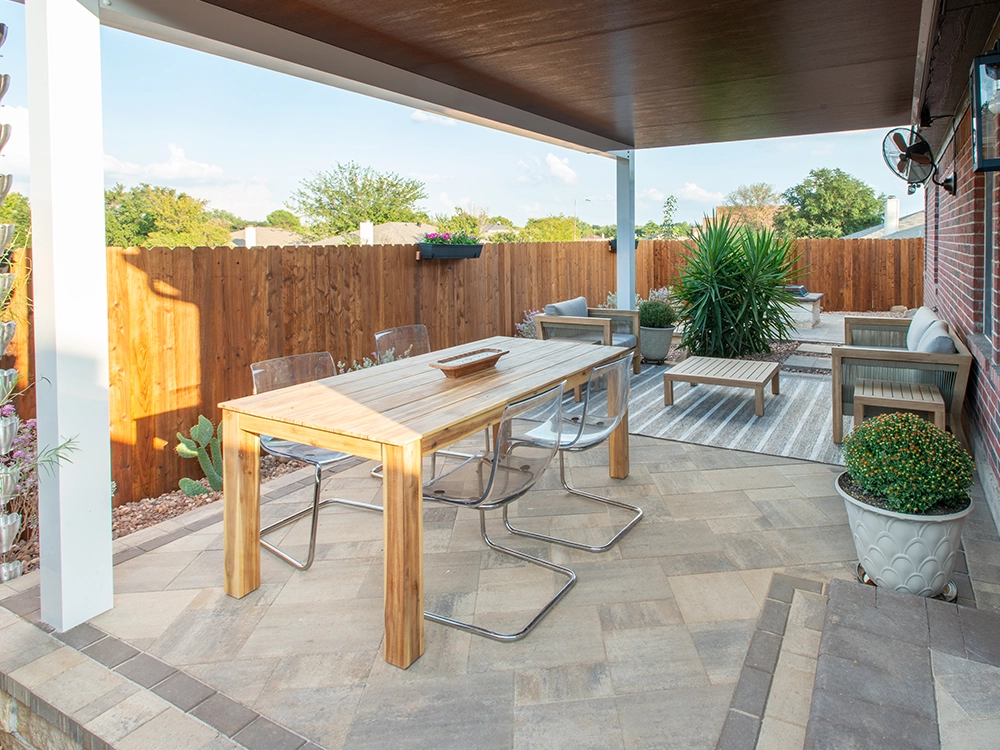 Back paver patio in Texas with a pergola. 