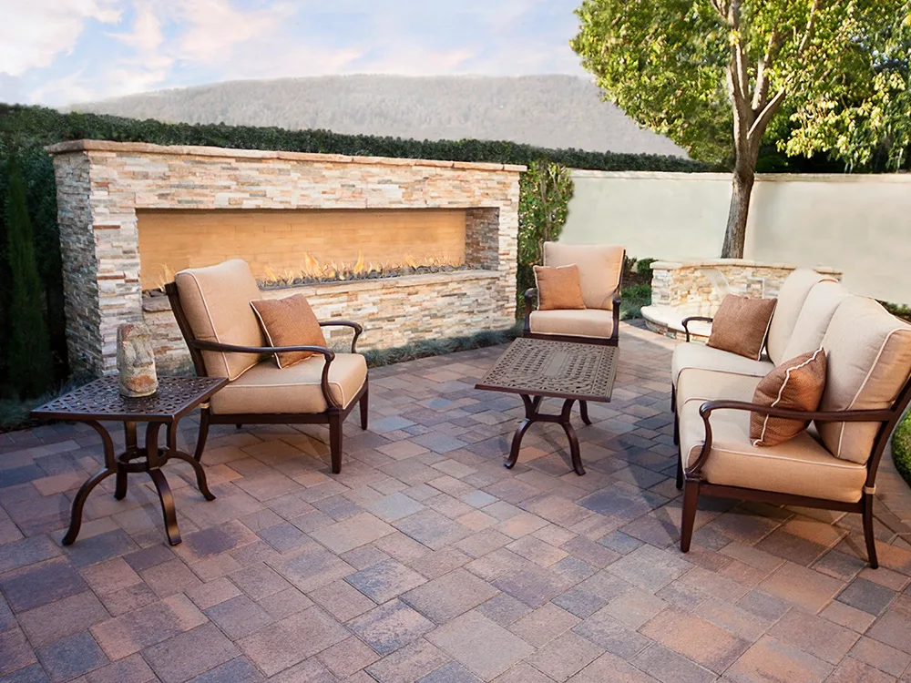 Backyard fire place on a paver patio in California. 