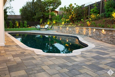 pool with paver pool deck