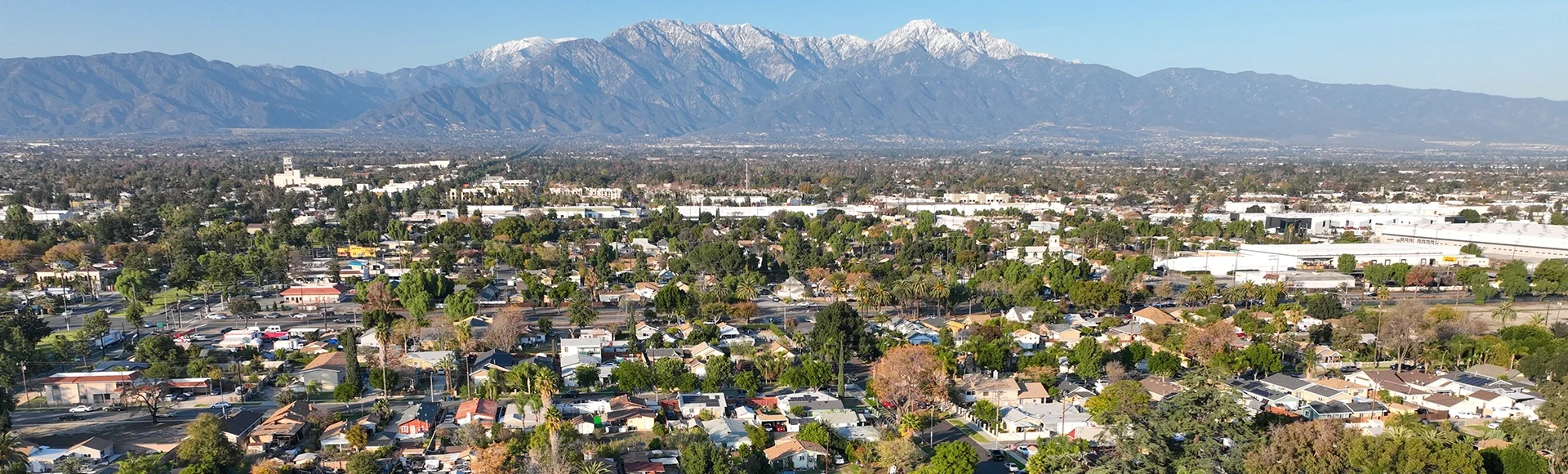Aerial view of Ontario city in California with mountains in the background, California, USA