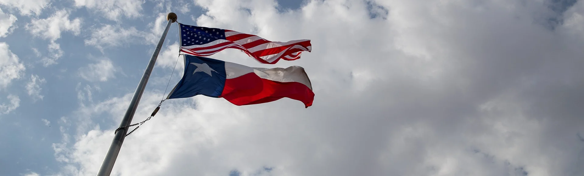 Texas and USA flag over Texas