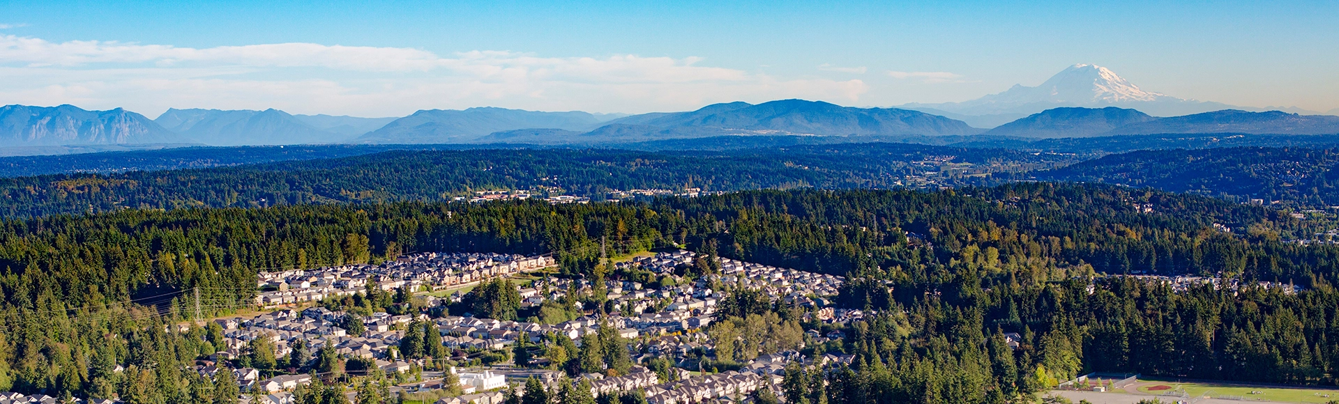 Bothell Mill Creek, Washington Suburban Forest Aerial - Mount Rainier and Cascade Mountains Backdrop