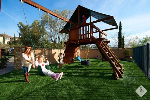 swingset on artificial turf