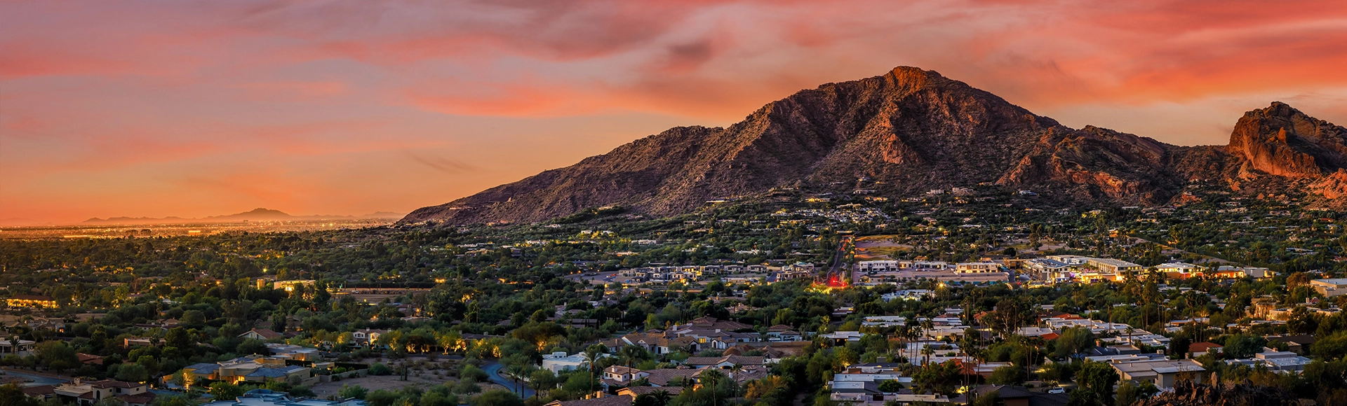 Image of Scottsdale, Arizona from afar with city and McDowell Mountains in the background