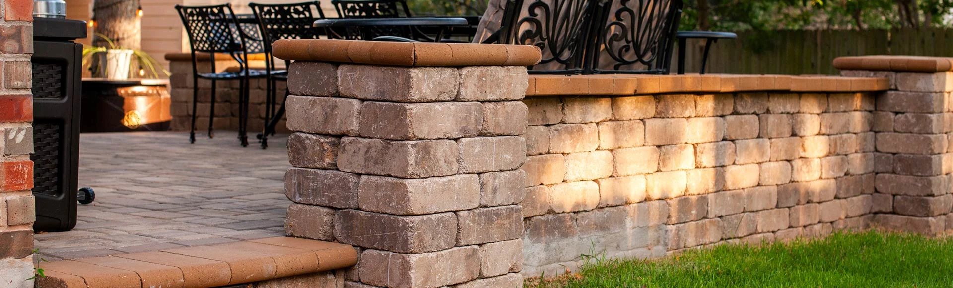 Paver patio, walls, pillars, steps, closeup, backyard, patio furniture, universal region, daytime